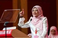 Nurul Amal berucap pada Perhimpunan Agung Puteri UMNO sempena Perhimpunan Agung UMNO (PAU) 2026 di Dewan Merdeka, Pusat Dagangan Dunia Kuala Lumpur pada Khamis. Foto Bernama