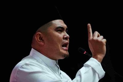 Dr Muhamad Akmal menyampaikan ucapan dasar pada Perasmian Perhimpunan Agung Pergerakan Pemuda UMNO 2026 sempena Perhimpunan Agung UMNO 2026 di Dewan Merdeka, Pusat Dagangan Dunia Kuala Lumpur pada Khamis. Foto Bernama 