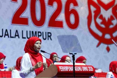 Noraini berucap ketika Perhimpunan Agung Wanita UMNO 2026 sempena Perhimpunan Agung UMNO 2026 di Dewan Merdeka, Pusat Dagangan Dunia Kuala Lumpur pada Khamis. Foto Bernama