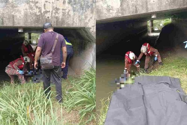 Anggota bomba bertugas sedang mengangkat mayat lelaki yang ditemui dalam longkang berhampiran sekolah pada Jumaat. Foto bomba 