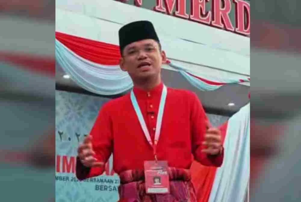 Mohd Afifi semasa mengulas ucapan dasar dan perasmian Presiden UMNO pada Perhimpunan Agung UMNO.