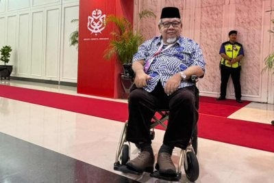 Rus Bakarurraini gigih hadir ke PAU 2026 walaupun berkerusi roda pada Sabtu. - FOTO: Rus Bakarurraini