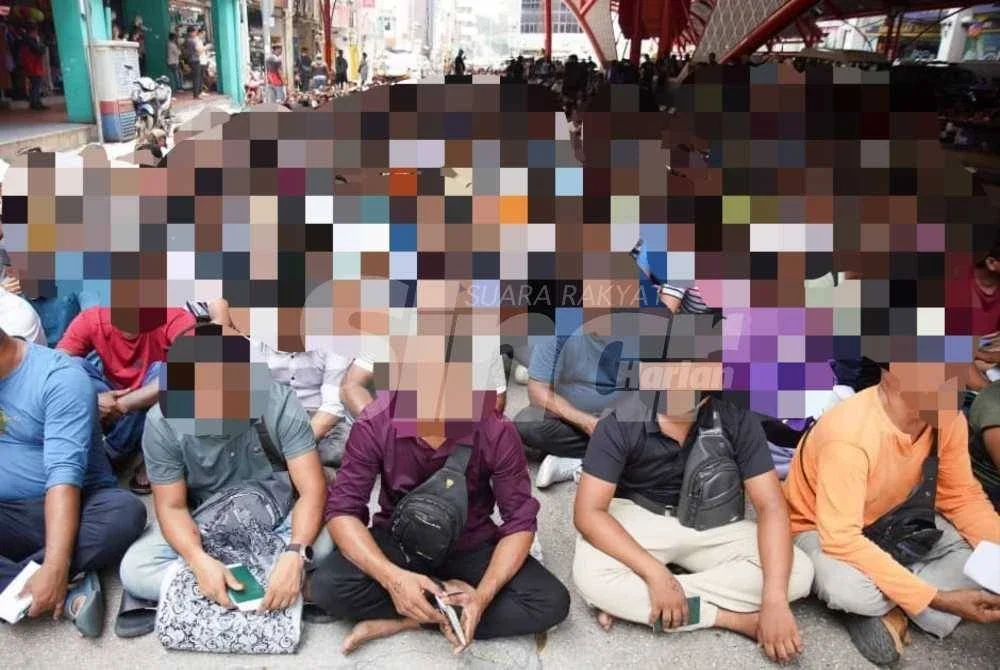 Antara warga asing yang diperiksa dalam Op Bersepadu Mega. - FOTO: Rosli Talib