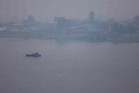 Pemandangan berjerebu dirakam di Tebingan Sungai Kuching. - Bernama