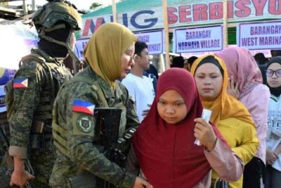 Pengundi mengundi pada Isnin dalam pilihan raya Parlimen. Foto: AFP