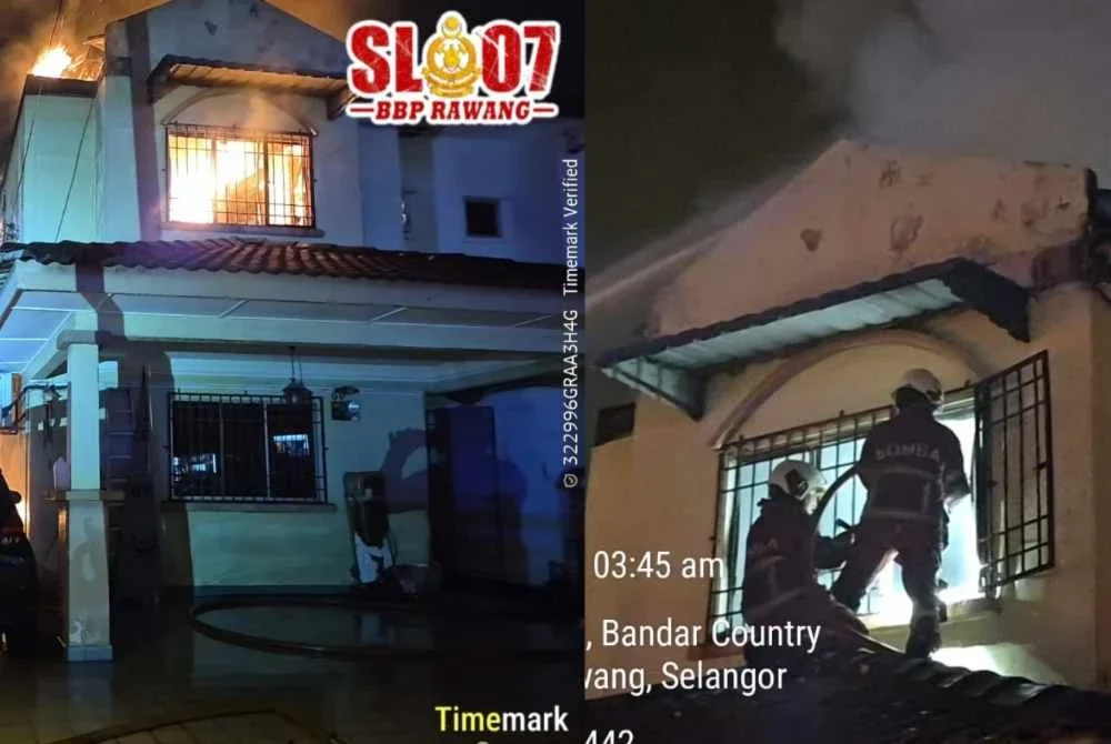 Anggota bomba sedang memadamkan kebakaran tiga buah rumah pada Selasa.