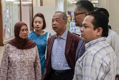 Muhyiddin hadir di Mahkamah Tinggi pada Selasa. Foto Bernama 
