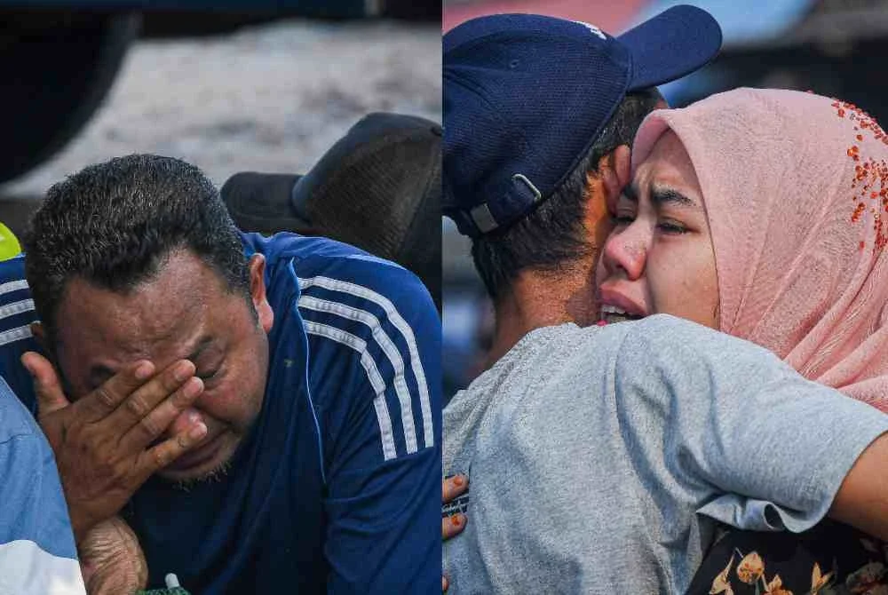 Ahli keluarga tidak dapat menahan kesedihan susulan penemuan satu mayat daripada tiga pemancing hilang di perairan Hutan Melintang, Perak, semalam. Foto Bernama