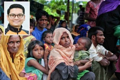 Kerajaan perlu mengimbangi tuntutan kemanusiaan dengan tanggungjawab menjaga kedaulatan, keselamatan dan kestabilan negara.Gambar kecil: Mohammed Taufiq