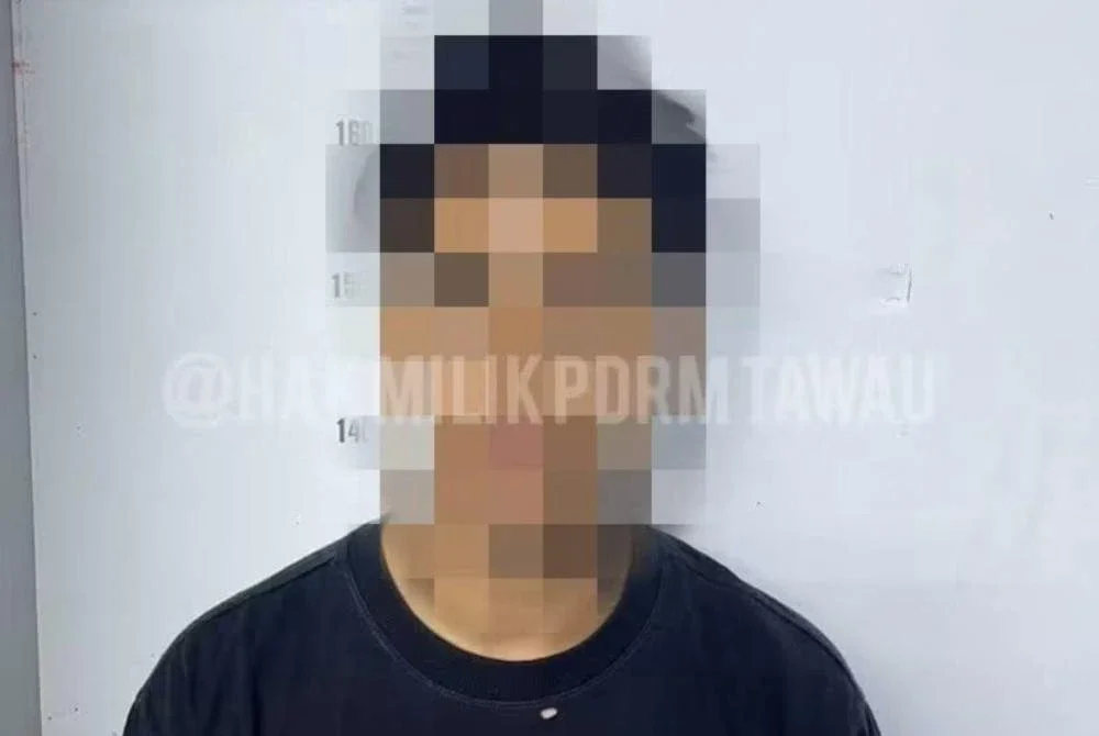 Suspek ditahan selepas dipercayai merogol jirannya di sebuah kampung di Tawau. Foto IPD Tawau