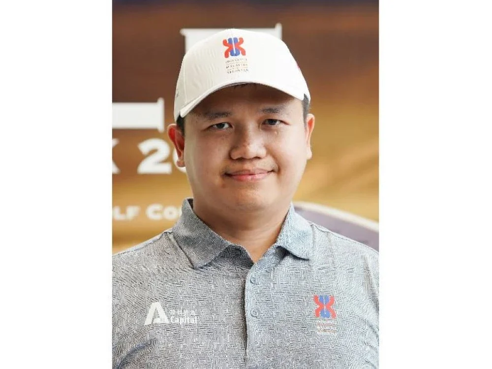 JOHN TAN