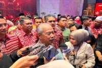 Muhyiddin ketika ditemui pemberita pada sambutan Ulang Tahun ke-10 Bersatu di Petaling Jaya pada Sabtu.