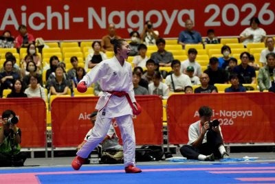 Adeola menghadiahkan pingat emas pertama untuk Malaysia. Foto: Majlis Sukan Negara