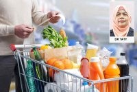 Kesan kenaikan harga barang ini amat dirasai oleh pengguna terutama bagi mereka yang berpendapatan rendah. - Gambar hiasan