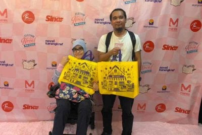 Sizarifalina Mohd Ali dan suaminya Surizat Amaludin