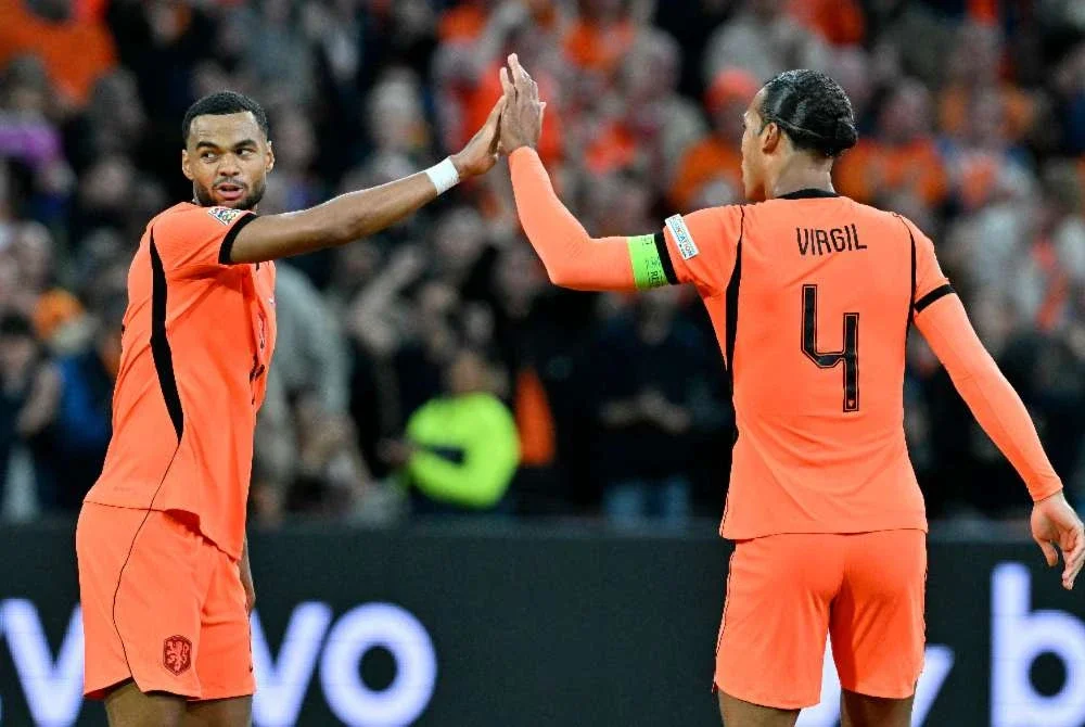 Gakpo (kiri) menyelamatkan maruah Belanda apabila menyumbat gol penyamaan ketika mengikat Jerman 1-1 dalam saingan Liga Negara-Negara UEFA di Amsterdam. Foto: AFP