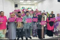 Yadim dan badan bukan kerajaan memegang risalah sebagai menyokong usaha memperkukuh wanita melalui al-Quran.
