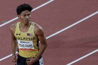 Azeem menampilkan larian bertenaga untuk menamatkan saingan separuh akhir di tempat kedua dalam saringan kedua di Nagoya City Mizuho Park Athletic Stadium. Foto: Bernama