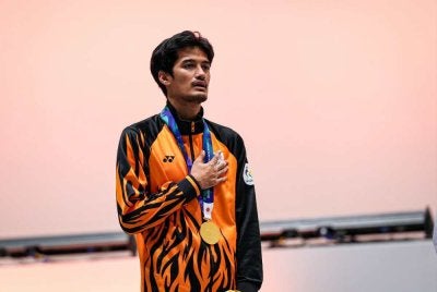 Taj Izrin muncul atlet e-sukan pertama negara memenangi pingat emas Sukan Asia. Foto: Bernama.
