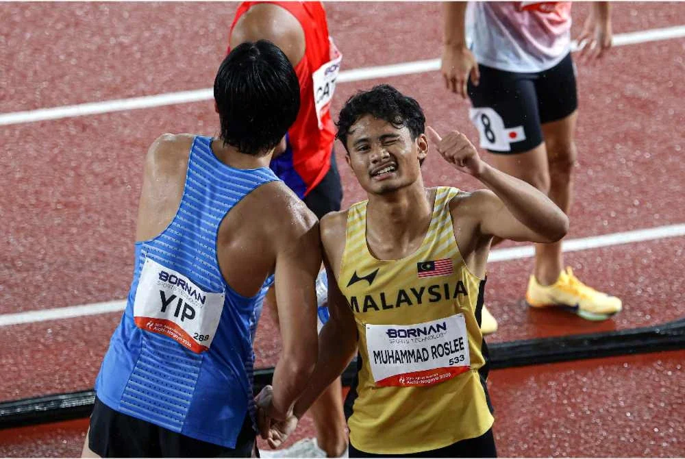 Reaksi Danish (kanan) selepas beraksi dalam saingan separuh akhir saringan pertama 200m Nagoya pada Sabtu. Foto: Bernama.
