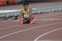 Azeem mengalami kekejangan otot ketika saingan akhir acara 100m Sukan Asia di Nagoya Jumaat lalu. - FOTO: Bernama.