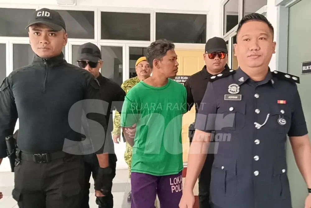 Abadi (tengah) dihadapkan ke Mahkamah Majistret di sini pada Isnin atas pertuduhan membunuh anak saudara.