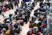 Thai Airways berusaha menyelesaikan lambakan bagasi penumpang di Lapangan Terbang Antarabangsa Suvarnabhumi. - FOTO: Gulf News