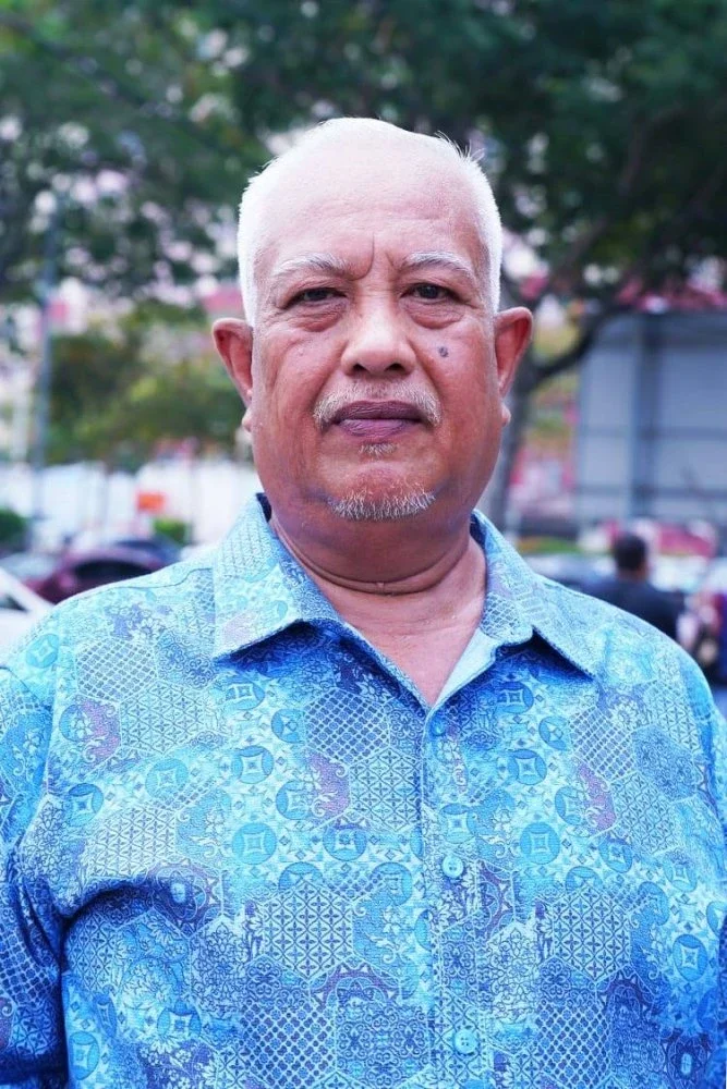 MOHD ZAINI