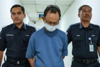Mat Salleh (tengah) dijatuhi hukuman penjara dua tahun oleh Mahkamah Rayuan pada Jumaat kerana mencabul seorang bekas atlet lelaki SUKMA pada 2017. Foto Bernama
