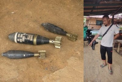 Md Raduan menunjukkan tempat tiga butir disyaki bom mortar yang diletakkannya di depan rumahnya di Kampung Dato' Ahmad Razali, Sepang pada Jumaat.