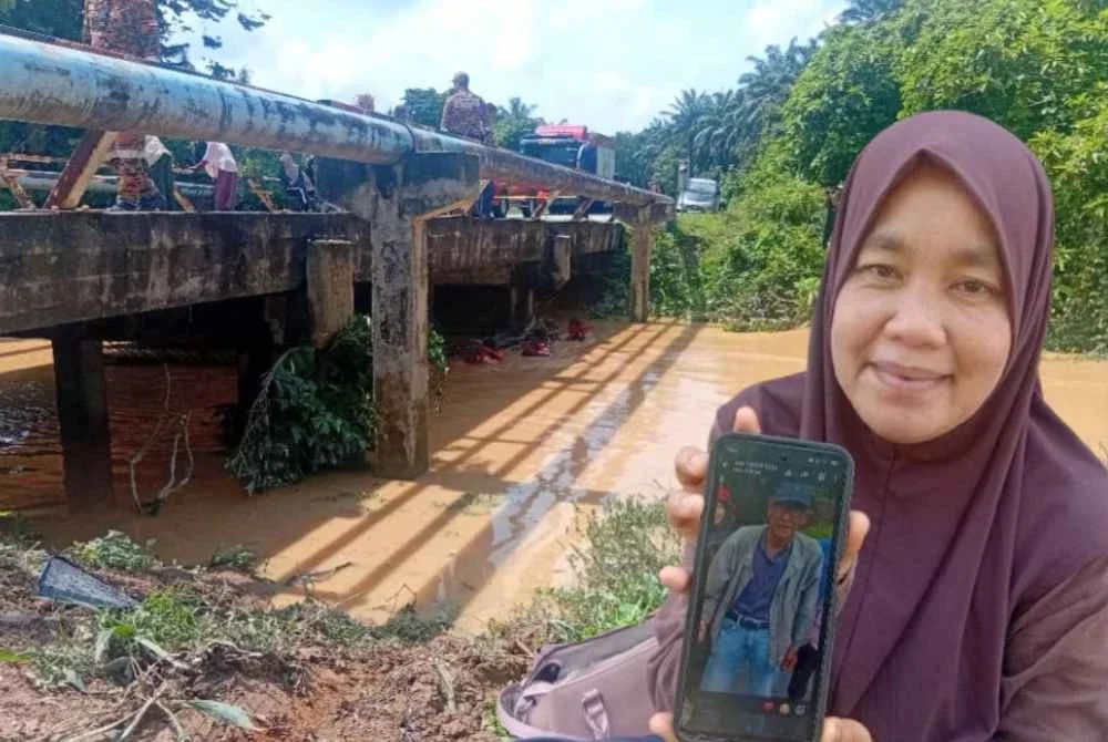 Siti Syarifah menunjukkan gambar bapa mentuanya.