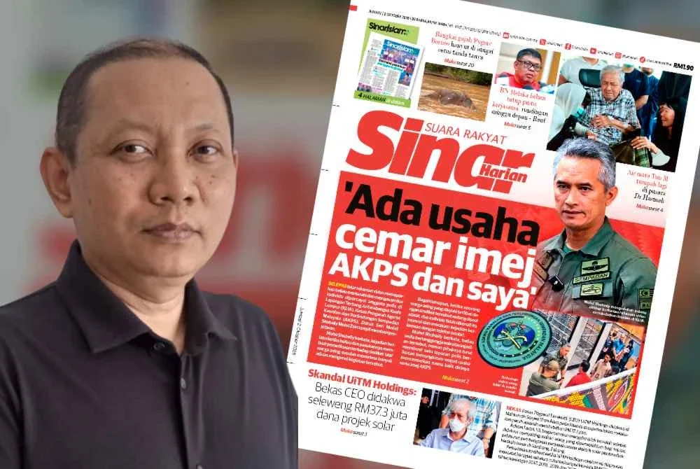 Laporan Sinar Harian pada Jumaat dan Zaki (kiri).