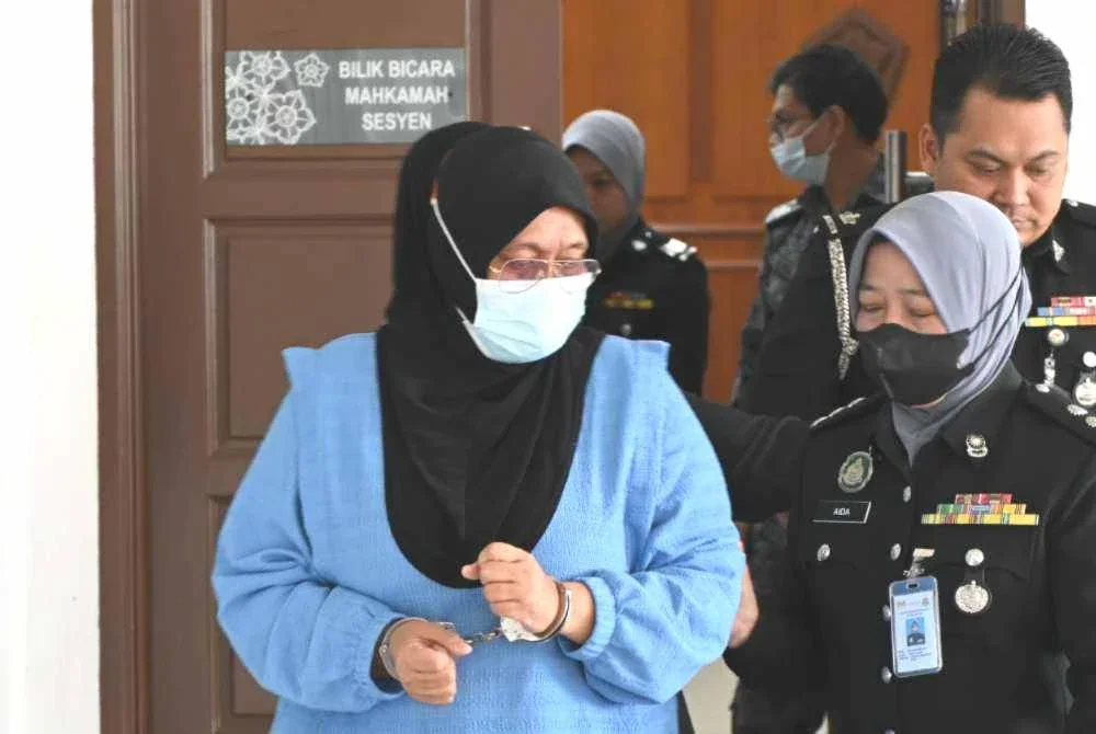 Suri rumah dijatuhi hukuman penjara 12 bulan dan denda RM8,000 kerana menyamar sebagai pengarah kanan imigresen. Foto JIM Melaka