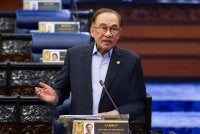Anwar ketika sesi Pertanyaan-Pertanyaan Bagi Jawab Lisan sempena Mesyuarat Ketiga, Penggal Kelima, Parlimen ke-15 di Bangunan Parlimen pada Selasa. Foto: Bernama 