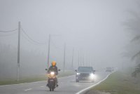 Situasi jerebu yang melanda negara juga turut menyebabkan beberapa lokasi menunjukkan bacaan IPU pada paras tidak sihat. Foto: Bernama 