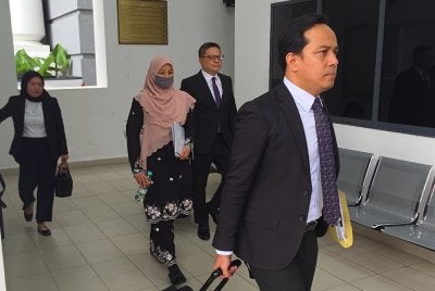Noraidah tiba di Mahkamah Koroner Kota Kinabalu pada Rabu.