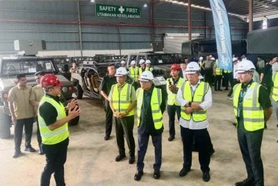 Mohamed Khaled diberikan penerangan ketika mengadakan lawatan kerja ke syarikat pertahanan tempatan, High Point Worldwide Sdn Bhd pada Rabu.