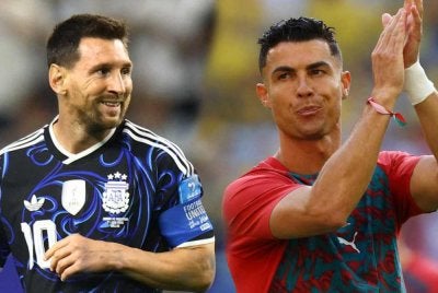 Ronaldo (kanan) memberi penghormatan terhadap legasi yang ditinggalkan Messi bersama skuad Argentina. Foto: Agensi.