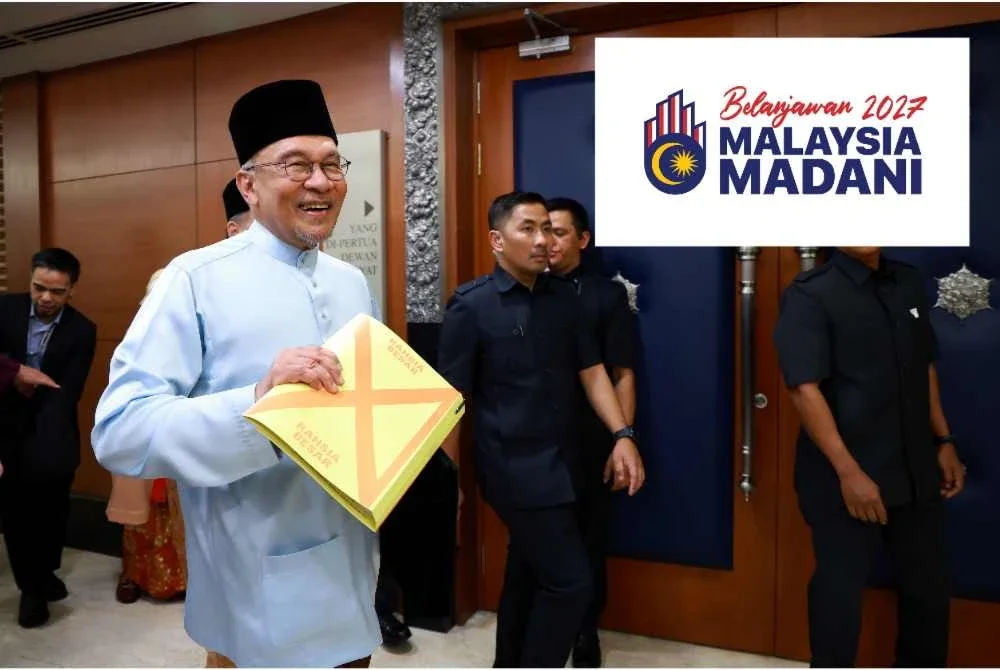 Perdana Menteri Datuk Seri Anwar Ibrahim menunjukkan dokumen Belanjawan 2027 di Dewan Rakyat, hari ini. Foto Bernama