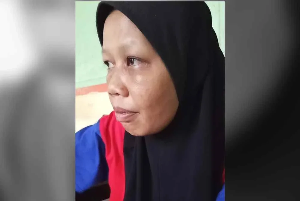 Julaiha tidak dapat menahan sebak mengenangkan kejadian kemalangan meragut nyawa tiga anaknya.