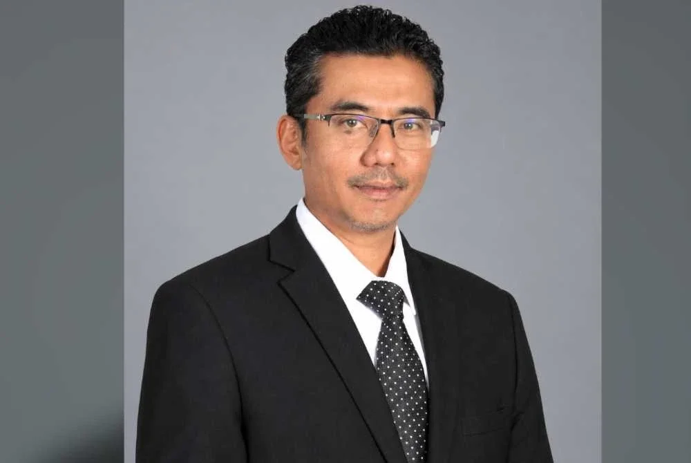 Dr Harizal