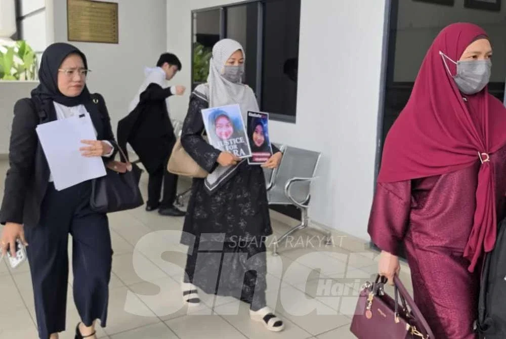 Noraidah ketika hadir di Mahkamah Koroner Kota Kinabalu bagi prosiding inkues kematian anaknya, Zara Qairina.