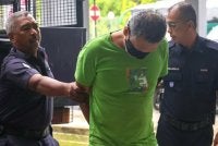 Seorang penganggur mengaku tidak bersalah atas dua pertuduhan mencederakan isteri dan ibu mentua menggunakan pisau, minggu lepas. - Foto Bernama