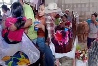 Rakaman video yang tular di media sosial menunjukkan beberapa individu mengerumuni keranda sebelum membantu remaja berkenaan bangun dan keluar - Foto: Agensi