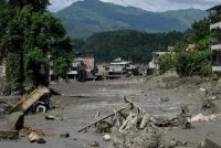 Rumah-rumah ditenggelami lumpur susulan banjir kilat di Trishuli Bazar, daerah Nuwakot, Nepal pada 26 Ogos lalu. Foto: AFP