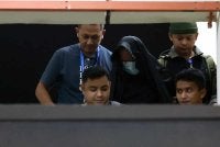 Seorang lelaki yang dipercayai suami kepada pegawai wanita Jabatan Kastam Diraja Malaysia (JKDM) yang ditemukan maut, dibawa oleh anggota polis berhampiran kediaman di Kuarters Lapangan Terbang Antarabangsa Kuala Lumpur (KLIA) bagi membantu siasatan.