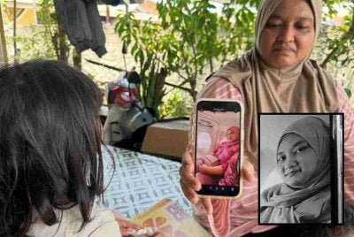 Marliza memegang gambar Norhazwani (gambar kecil) di telefon bimbit dan ditatap anak sulung mangsa.