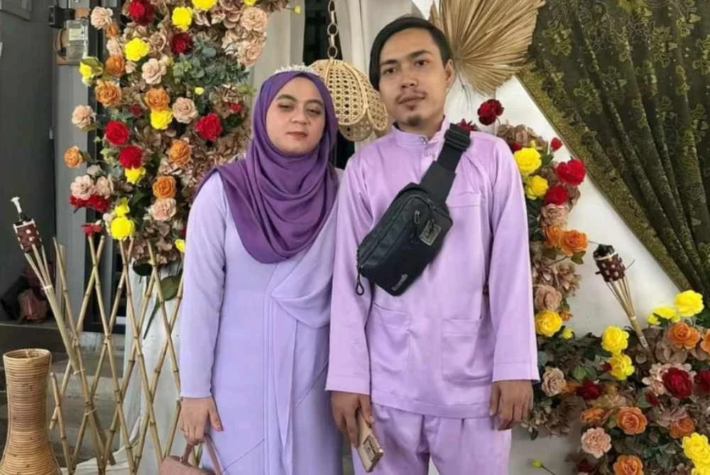 Ain (kiri) bersama suaminya, Ahmad Qatadah Sauti