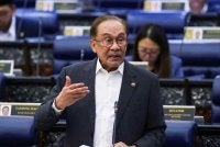Perdana Menteri yang juga Menteri Kewangan Datuk Seri Anwar Ibrahim ketika sesi Pertanyaan - Pertanyaan Bagi Jawab Lisan sempena Mesyuarat Ketiga, Penggal Kelima, Parlimen ke-15 di Bangunan Parlimen hari ini. Foto Bernama