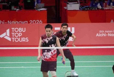 Liek Hou-Faris muncul juara acara beregu lelaki SU5. Foto Facebook Taufiq Johari
